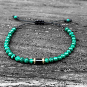 Pulsera bolas verdes entrepiezas de oro -